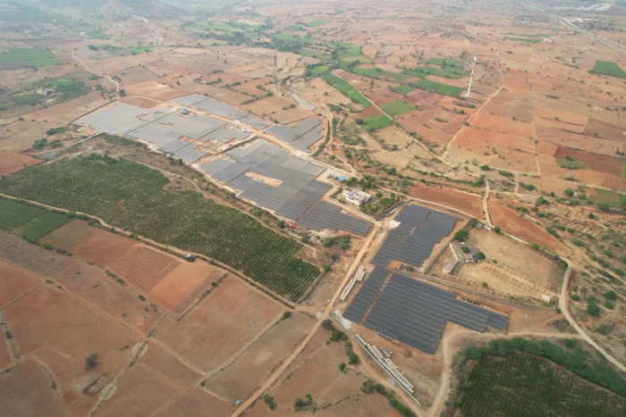 Ground-mounted solar photovoltaic (PV) panels generating green power for ISTS open access.